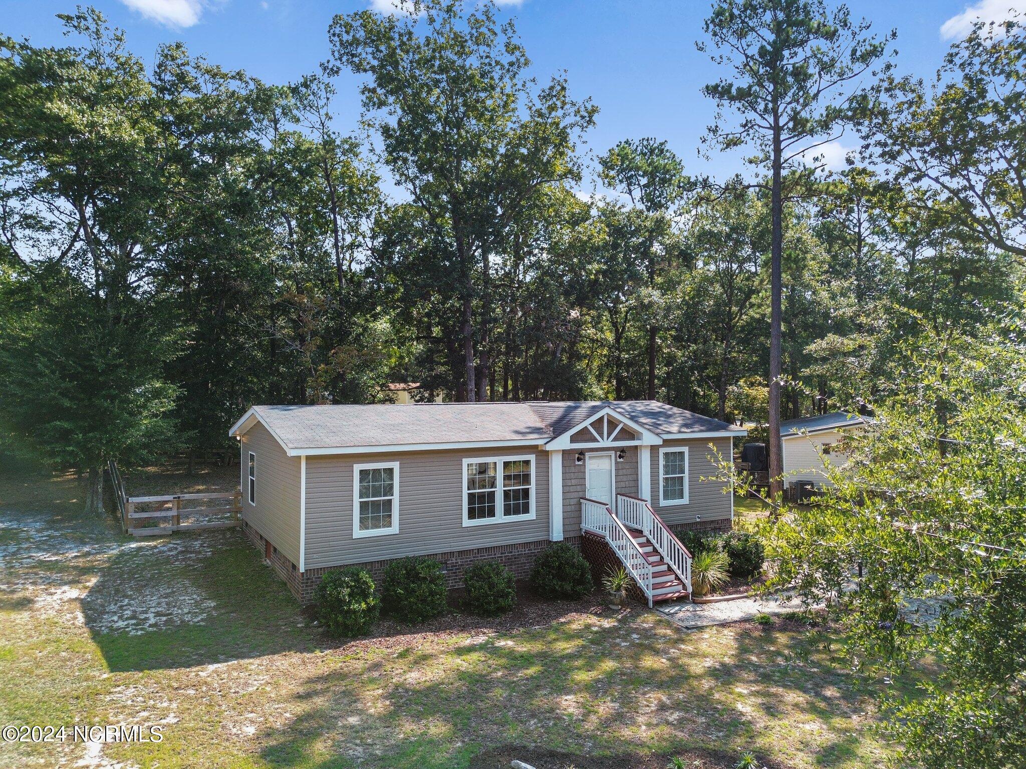 Roam Buy 3394 Marina Dr SE, Bolivia, NC with a 5.3 mortgage included.